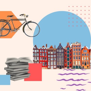 Häuserfront an den Amsterdamer Grachten, ein Fahrrad und Bücher