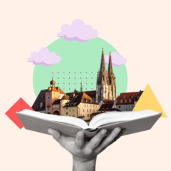 Das Stadtzentrum von Regensburg auf einem riesigen aufgeschlagenen Buch