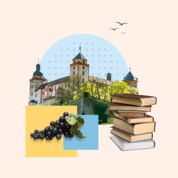 Die Festung Marienberg bei Würzburg, ein Stapel Bücher und Weintrauben