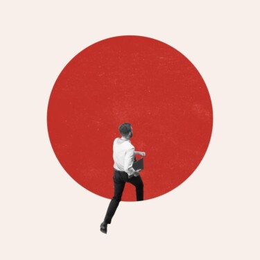 Eine Person mit Klemmbrett unter dem Arm steigt in einen großen roten Kreis.