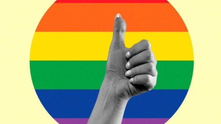 Daumen hoch vor Kreis in Regenbogenfarben