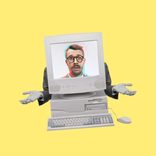 Ein Mann hebt fragend die Hände. Sein Torso wurde durch einen altmodischen Computer ersetzt, auf dessen Bildschirm sein Gesicht zu sehen ist.