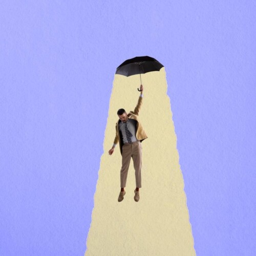 Mann mit Regenschirm wird vom Schirm nach oben getragen wie Hans Guck-in-die-Luft.