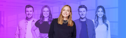 5 Mitarbeitende lächeln in die Kamera